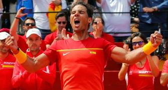 Spain enter Davis Cup semis after epic Ferrer win