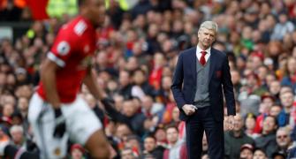 EPL: Fellaini header condemns Wenger to Old Trafford defeat