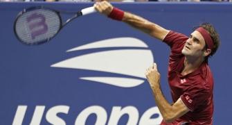 US Open PICS: Federer, Djokovic battle through in brutal heat