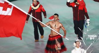 Tonga's flag bearer goes shirtless again at Winter Olympics