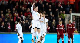 EPL PHOTOS: Liverpool stunned at Swansea
