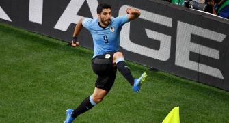 World Cup: Vintage Suarez on the spot as Uruguay go through