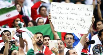 PHOTOS: The World Cup dream goes on for Iran despite Spain defeat