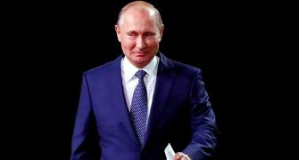 President Putin revels in Russia's unexpected World Cup form