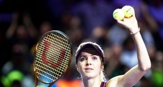 WTA Finals: Svitolina fights off Bertens to reach Singapore final