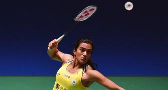 Sindhu advances; Saina crashes out in first round at China Open