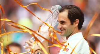 Federer ticks on with Swiss precision for 101st title