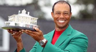 Woods wins Masters to claim first major in 11 years