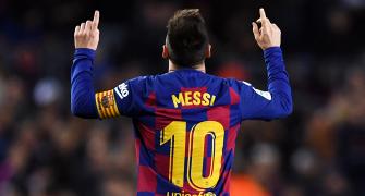 PIX: Messi 'tricks' Barcelona to top of La Liga