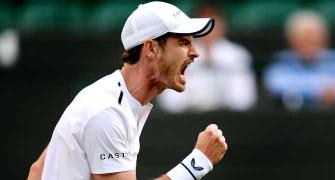 PIX: Murray makes winning doubles return