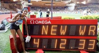 Hassan breaks women's mile world record; Gatlin fastest