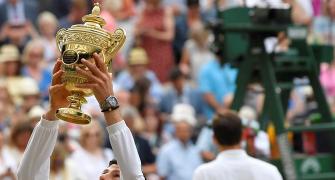Djokovic outlasts Federer to win fifth Wimbledon title