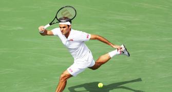 Tennis PIX: Federer, Nadal win openers; Serena retires