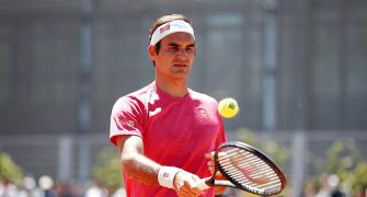 No lofty expectations for Federer on clay court return