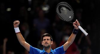 Djokovic thrashes Berrettini in ATP Finals opener