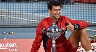 Djokovic wins Japan Open; Osaka takes 2nd Asian title