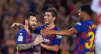 PIX: Messi nets first as nine-man Barca thrash Sevilla