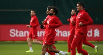 Champions League: Will Liverpool's Salah play at Genk?