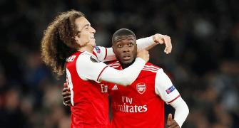 Europa PIX: Pepe spares Arsenal's blushes; United win