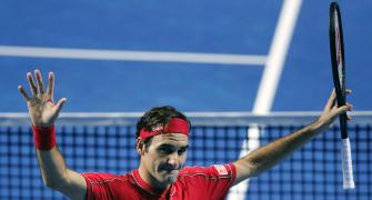 Federer ousts Tsitsipas for 50th win of the season