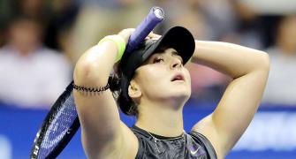 PICS: Andreescu sees off Mertens to make US Open semis