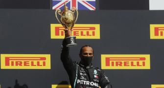 F1 PIX: Hamilton wins British GP with punctured tyre