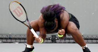 Sister Act: Serena beats Venus to reach quarters