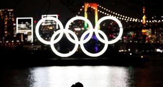 PIX: Olympic rings return to Tokyo Bay