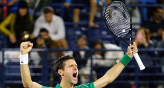 Djokovic stages great escape to enter Dubai final