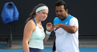 Paes bows out of Australian Open