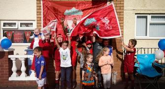 Long-suffering Liverpool fans get ready to celebrate