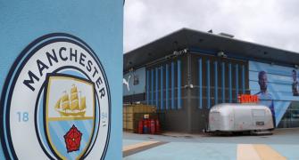 Here's how Man United, City are helping communities