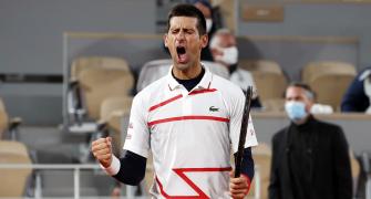 PIX: Djokovic survives scare to set up Tsitsipas semis