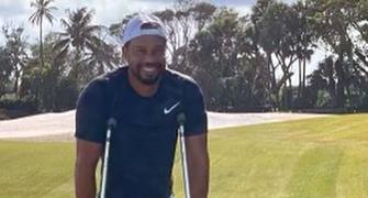 Tiger posts photo of himself on crutches