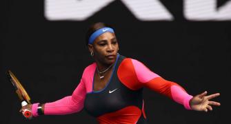 Serena channels Olympic champ FloJo with catty outfit