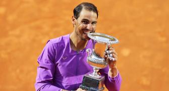 Nadal overcomes blip to down Djokovic in final