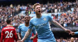 EPL PIX: City, Liverpool share spoils in pulsating tie