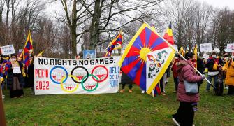 Tibetans protesting Beijing Games march to IOC HQ