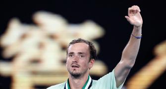 Medvedev channels 'inner Novak' to make semis