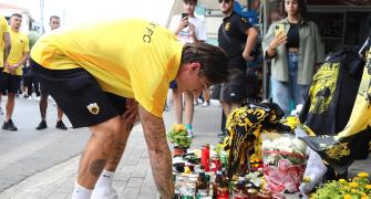Soccer fan dies after violent pre-match clashes