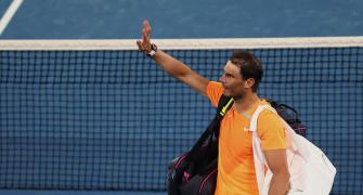 Returning from injury, Nadal suffers doubles defeat
