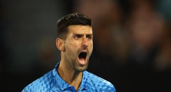 PIX: Djokovic fights back; Americans stun seeds