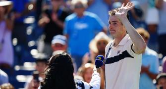 Teary-eyed Isner bids farewell after US Open loss