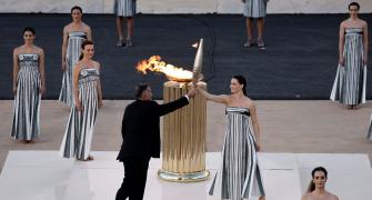 PIX: Paris organisers receive Olympic flame in Athens