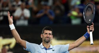 Ruthless Djokovic in quarters; Fritz stuns Tsitsipas