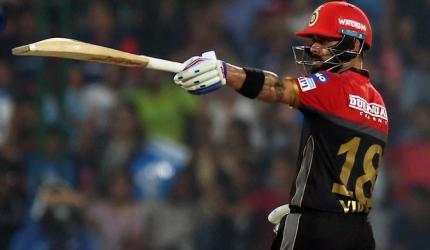 IPL PHOTOS: Kohli, de Villiers keep RCB's hopes alive