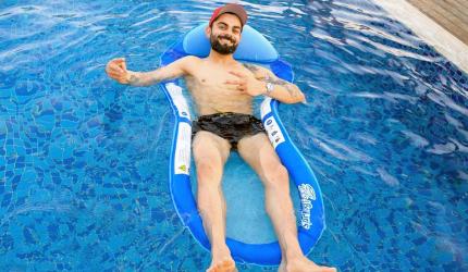 PIX: Kohli chills in the pool