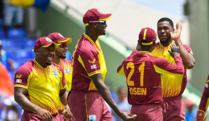 PIX: McCoy takes six as WI beat India by five wickets