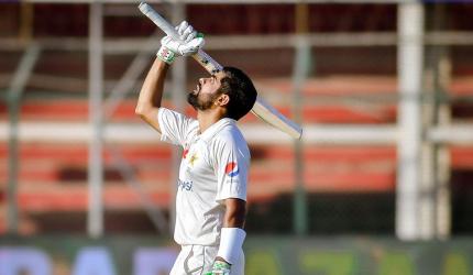 Babar's century stalls Australia's victory march