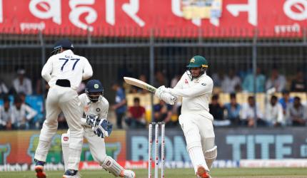 Spinners, Khawaja take honours on Day 1 at Indore